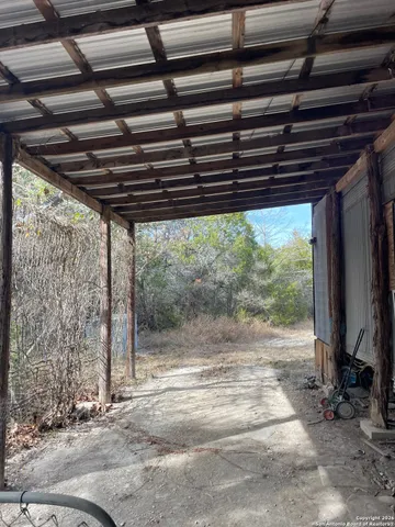 a view of backyard with green space