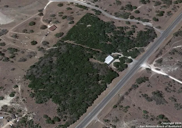 a view of balcony with wooden floor