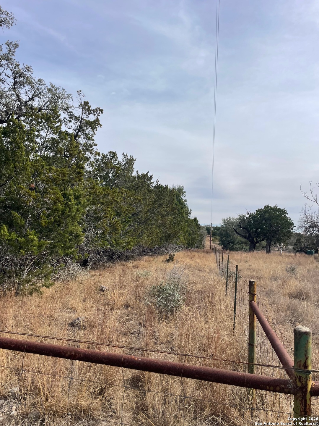7321 Highway 173 Bandera, TX 78003 - Photo 25 of 28 a view of a lake from a balcony