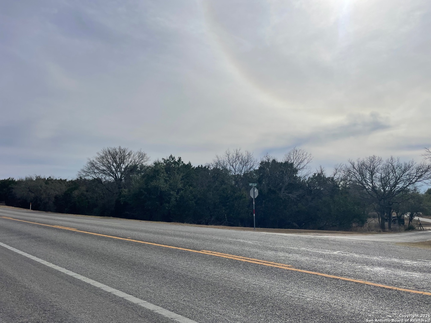 7321 Highway 173 Bandera, TX 78003 - Photo 28 of 28 a view of a rural road with plants