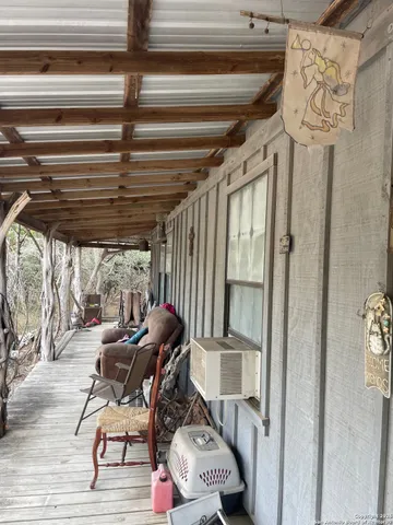 a patio with table and chairs