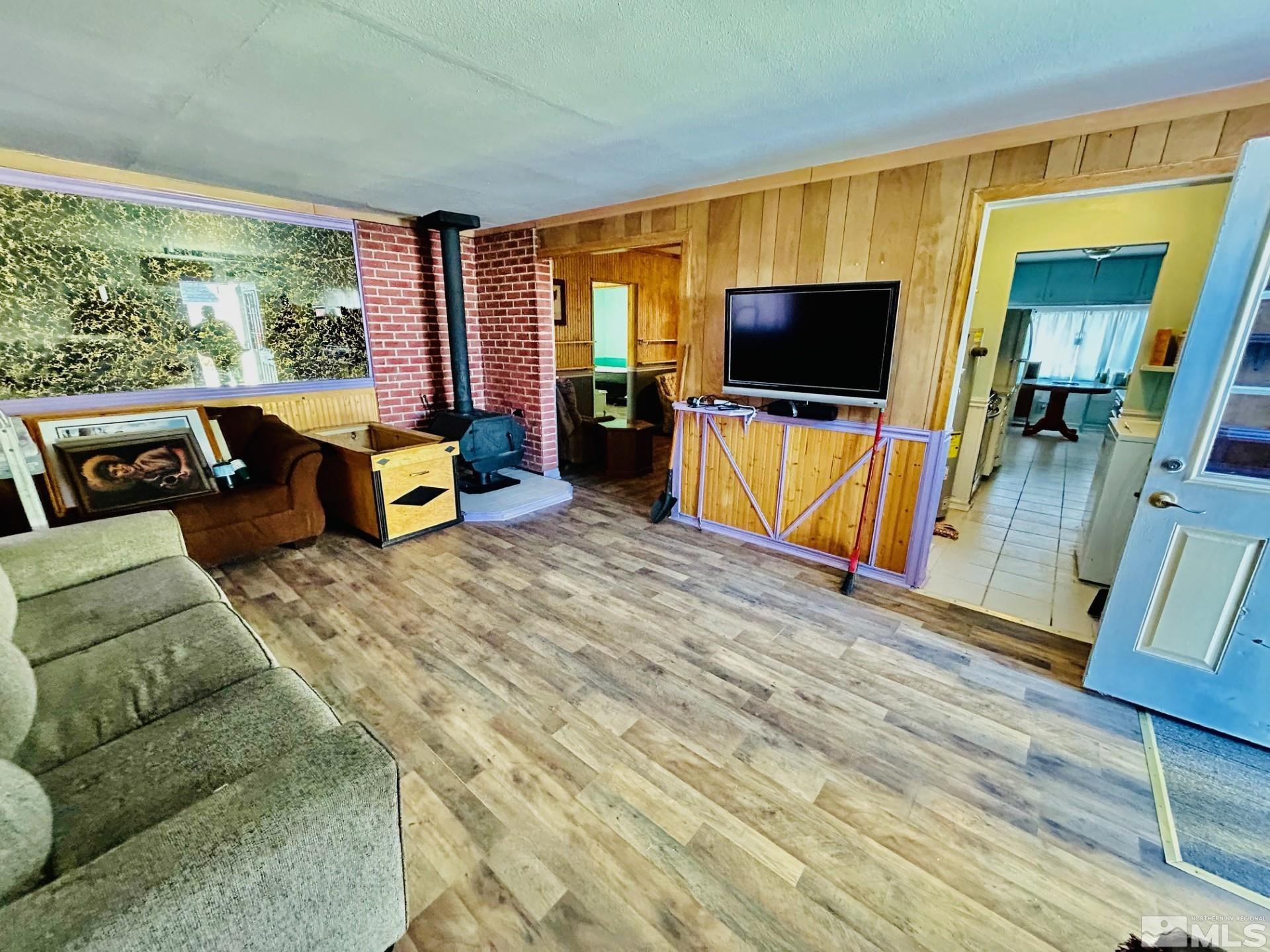 524 E Avenue Gabbs, NV 89409 - Photo 5 of 15 a living room with furniture and a flat screen tv