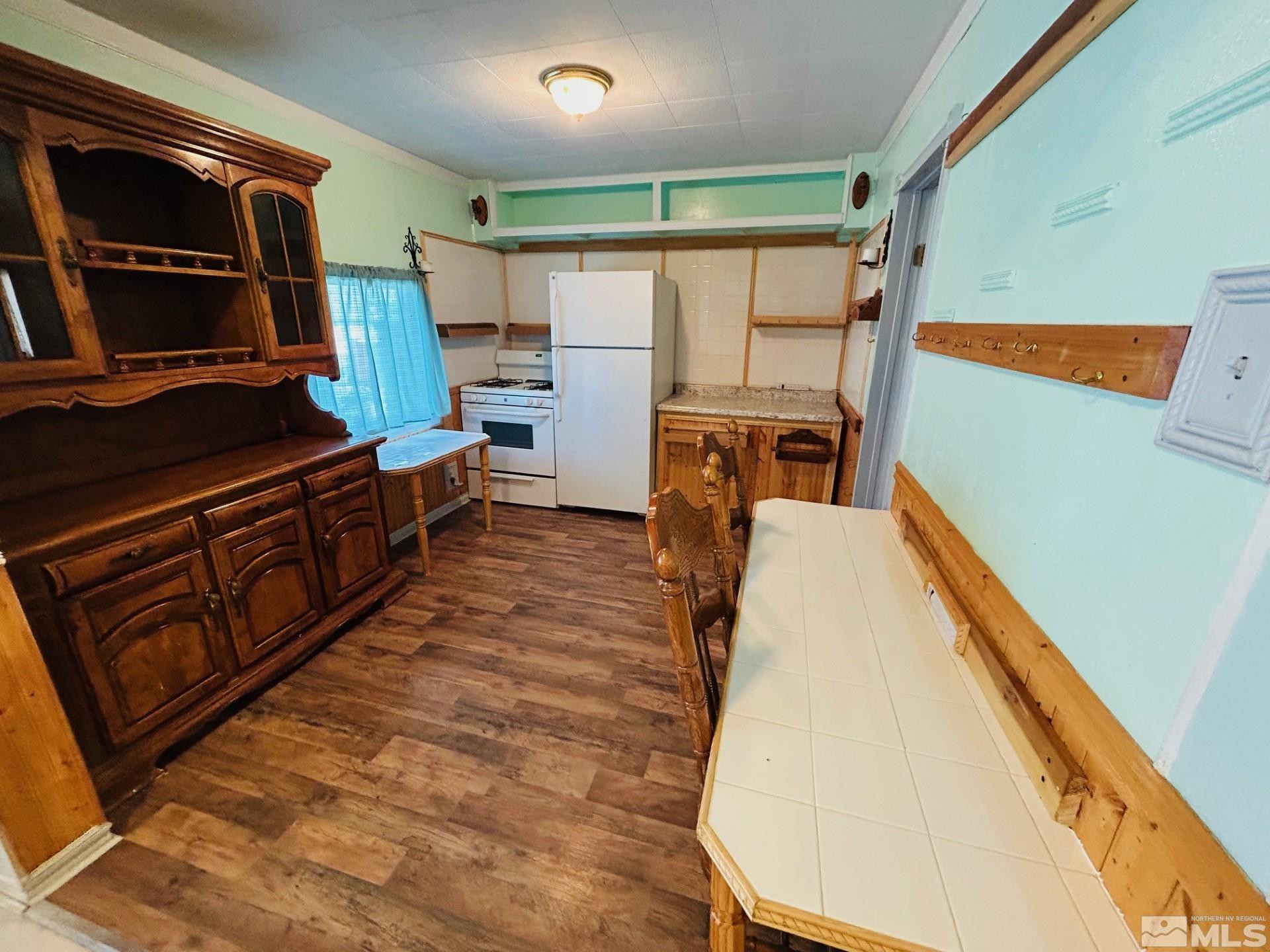 524 E Avenue Gabbs, NV 89409 - Photo 6 of 15 a view of kitchen with wooden floor