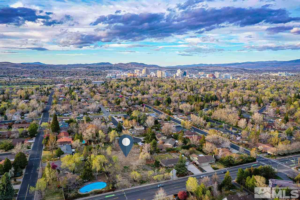 1133 West Plumb Lane Reno, NV 89509 - Photo 4 of 6 a view of a city with an ocean