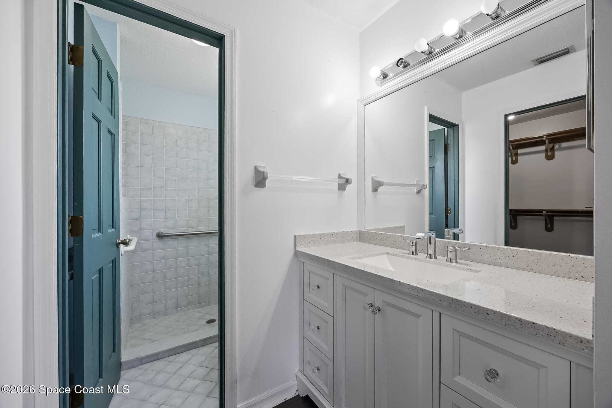 854 Dale Circle Sebastian, FL 32958 - Photo 14 of 31 a bathroom with a granite countertop sink mirror and double