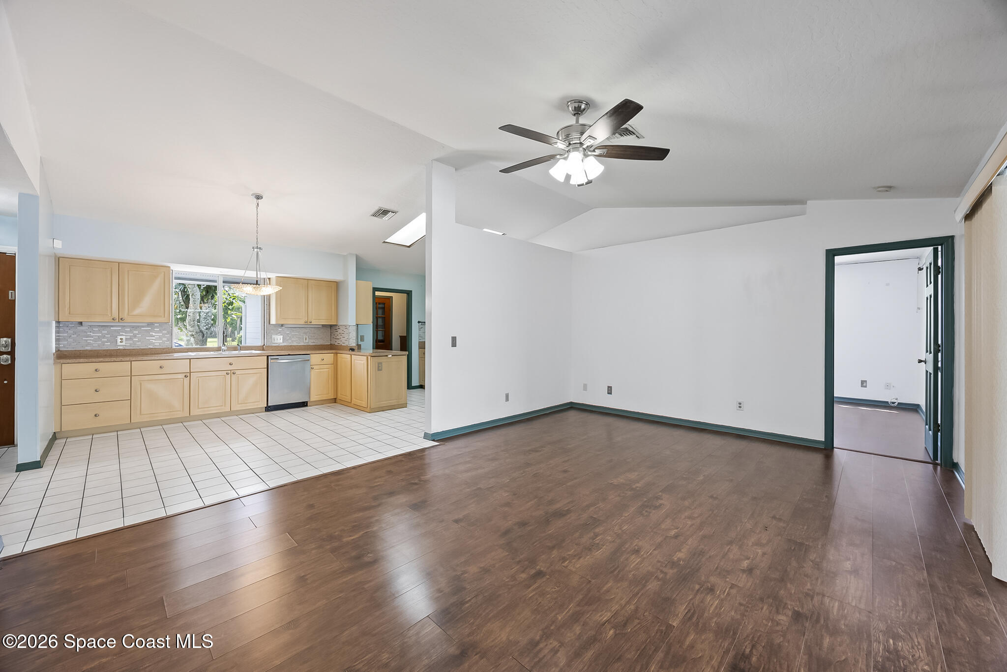 854 Dale Circle Sebastian, FL 32958 - Photo 4 of 31 a view of a kitchen with wooden floor and a kitchen