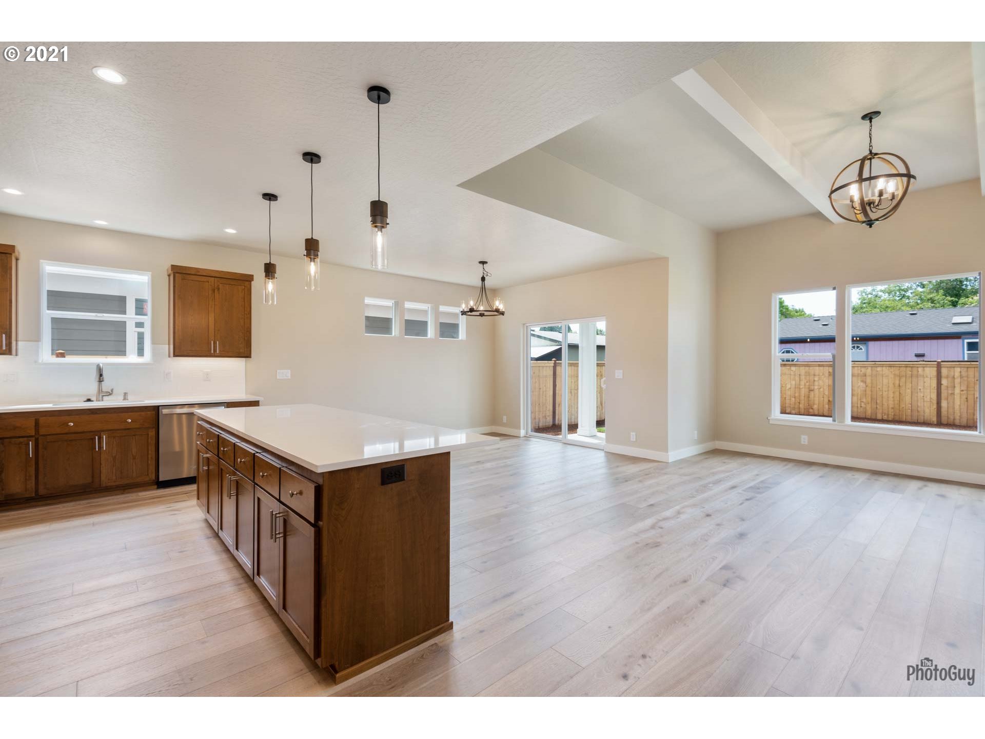 962 South 46th Street Springfield, OR 97478 - Photo 4 of 32 a kitchen with a sink and wooden floor