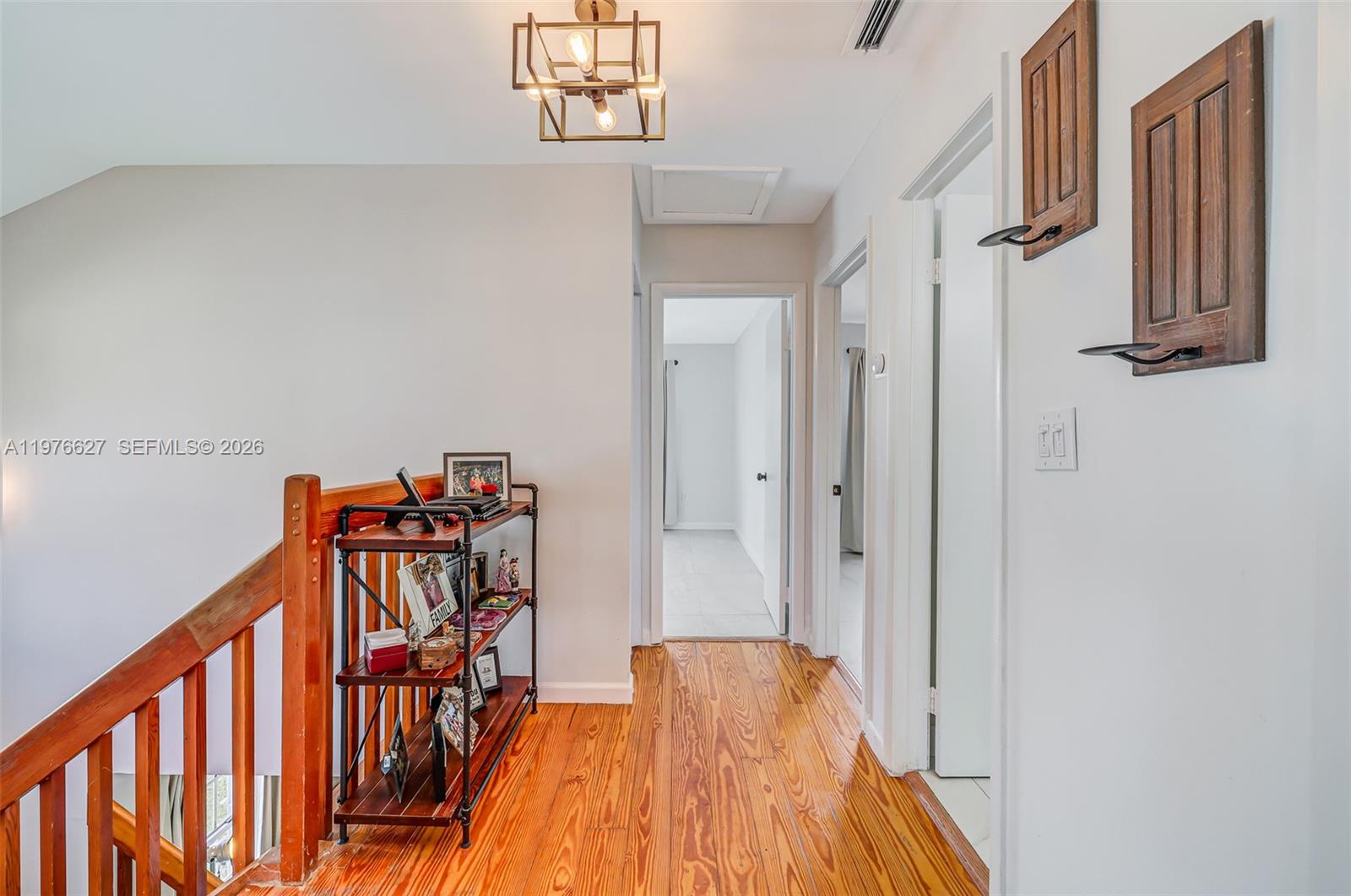 11747 Southwest 113th Terrace Miami, FL 33186 - Photo 23 of 46 a view of an entryway with wooden floor