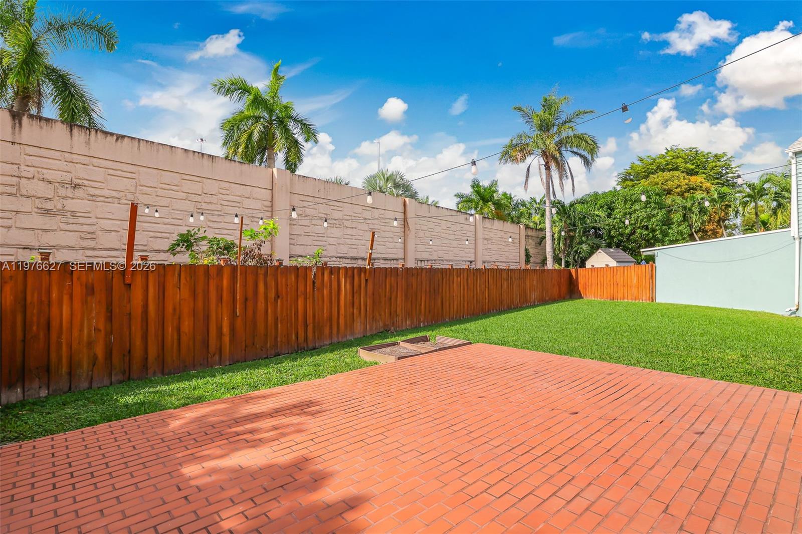 11747 Southwest 113th Terrace Miami, FL 33186 - Photo 30 of 46 a view of a backyard
