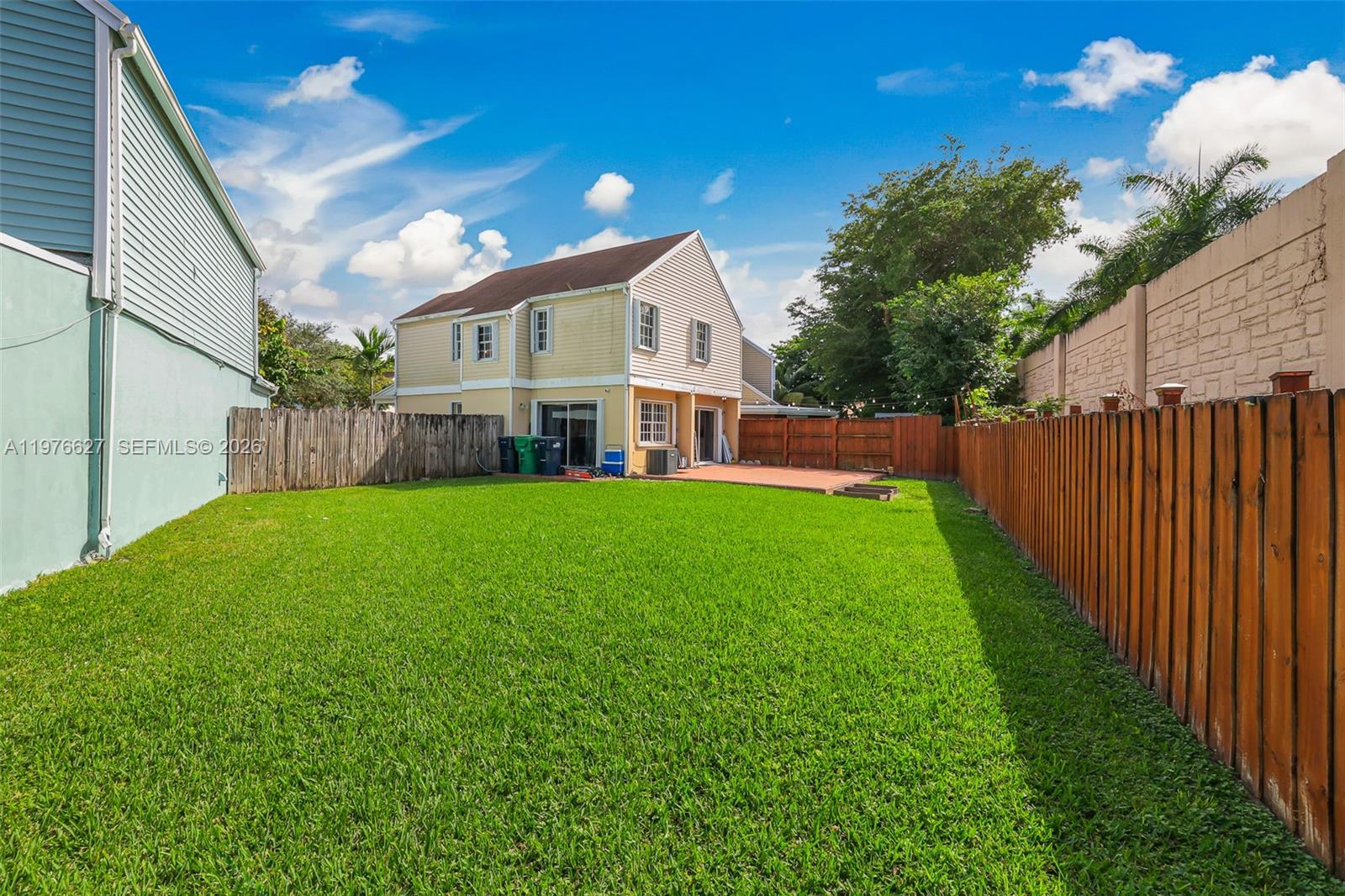 11747 Southwest 113th Terrace Miami, FL 33186 - Photo 34 of 46 a front view of house with yard and green space