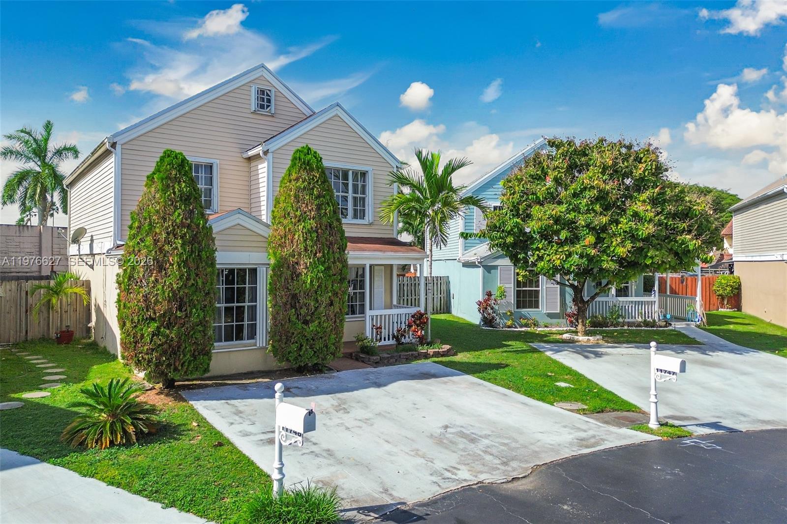 11747 Southwest 113th Terrace Miami, FL 33186 - Photo 39 of 46 a front view of a house with garden