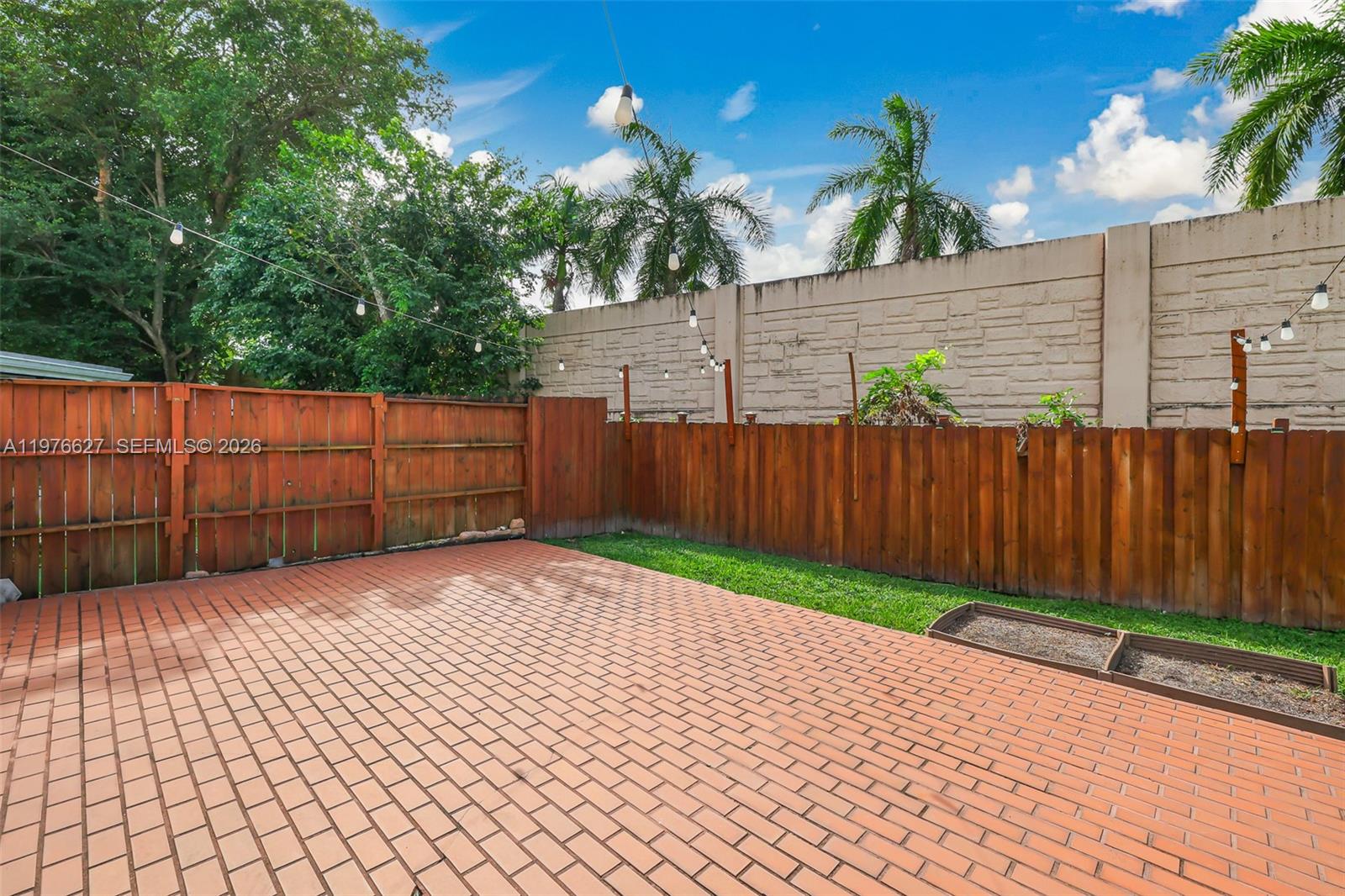 11747 Southwest 113th Terrace Miami, FL 33186 - Photo 43 of 46 a view of a backyard