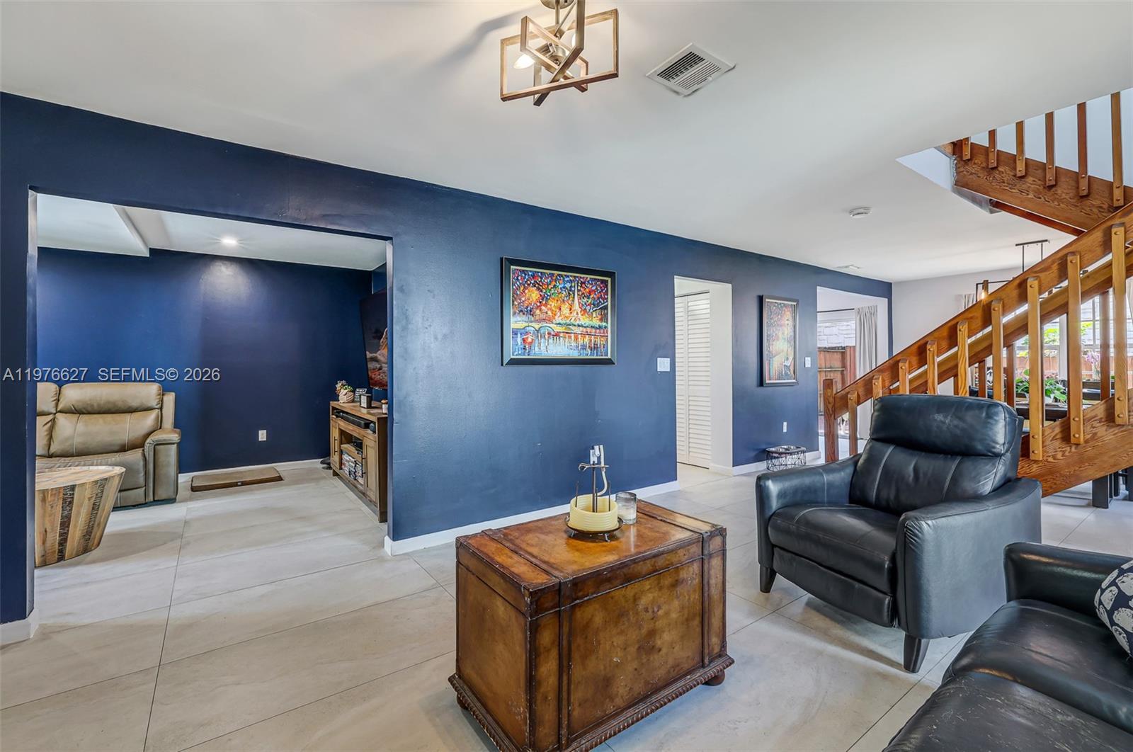 11747 Southwest 113th Terrace Miami, FL 33186 - Photo 8 of 46 a living room with furniture and a space