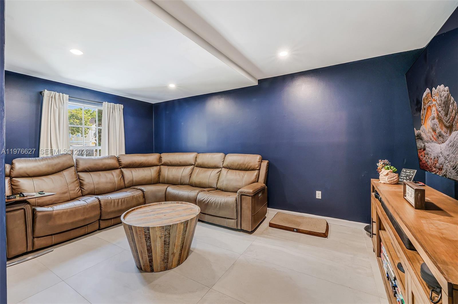 11747 Southwest 113th Terrace Miami, FL 33186 - Photo 9 of 46 a living room with furniture and a window