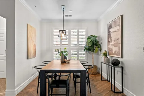 a kitchen with stainless steel appliances a refrigerator sink and cabinets