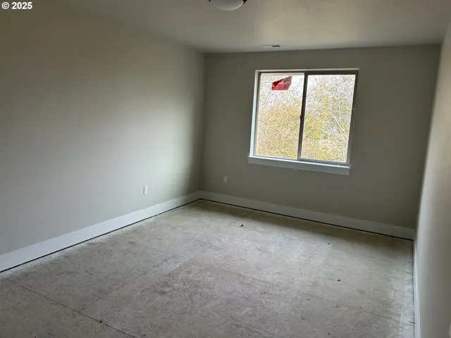 an empty room with a window