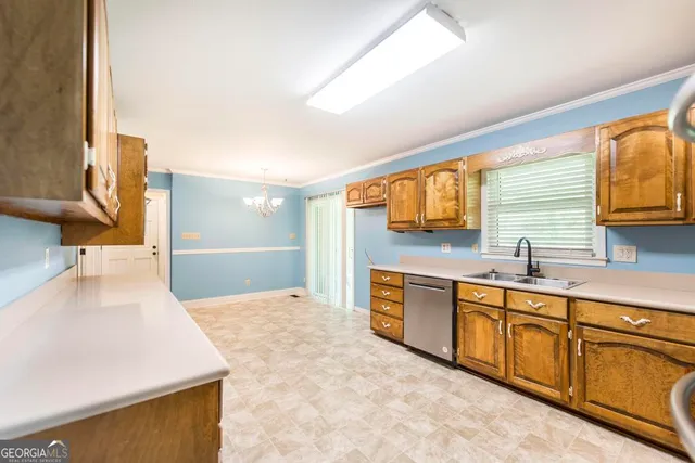 a large bathroom with a large tub sink and mirror