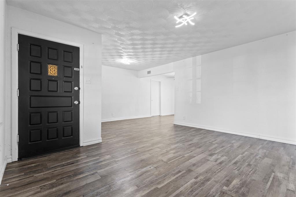 1809 Balla Way Grand Prairie, TX 75051 - Photo 3 of 26 wooden floor in an empty room