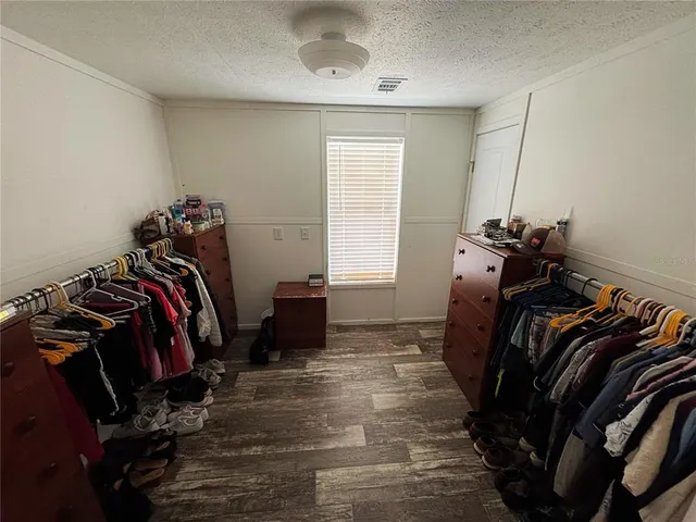 a bathroom with a toilet sink and a shower