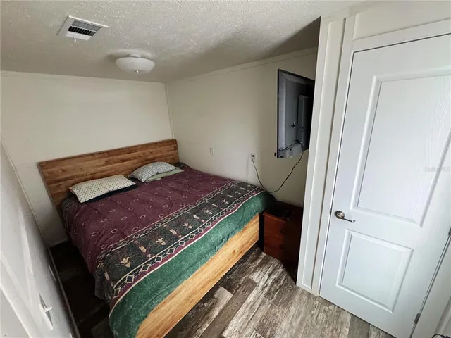 a white toilet sitting next to a shower curtain