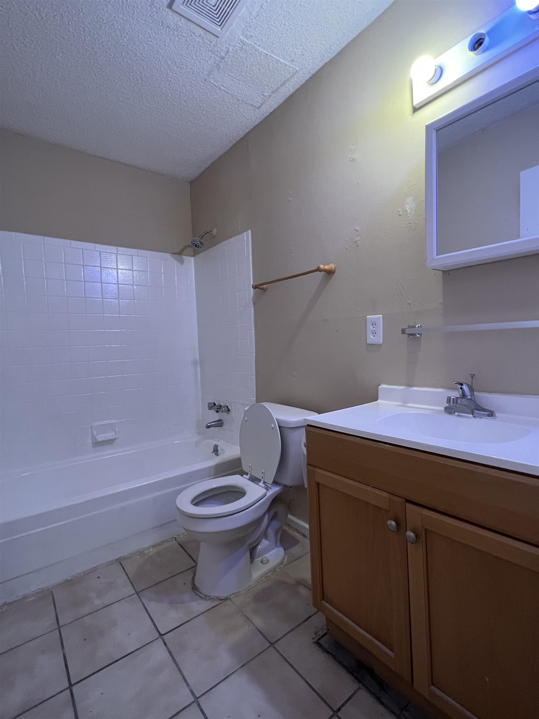 4651 Royal Ridge Drive Memphis, TN 38128 - Photo 13 of 13 a bathroom with a sink a toilet and shower