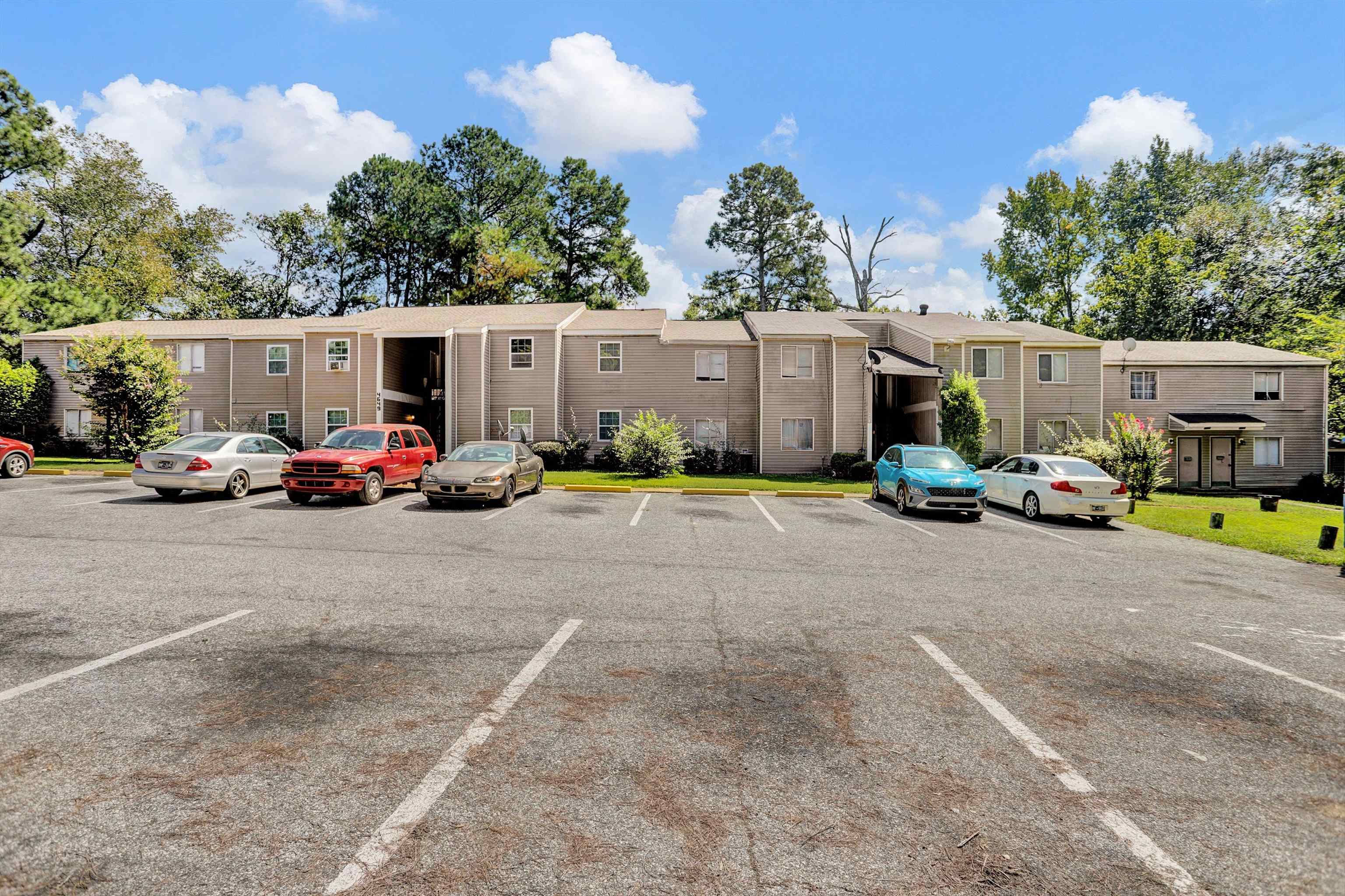 4651 Royal Ridge Drive Memphis, TN 38128 - Photo 7 of 13 a cars parked in front of a house