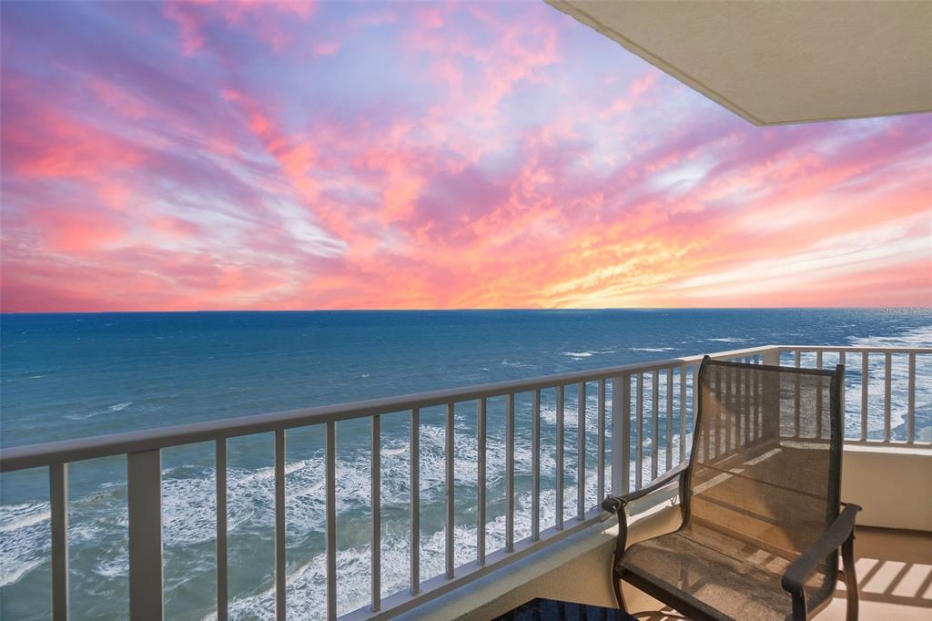 2937 South Atlantic Avenue, Unit 1907 Daytona Beach Shores, FL 32118 - Photo 28 of 55 a balcony with a swing