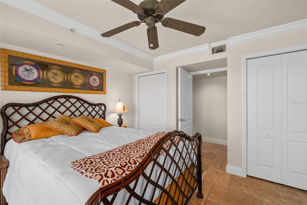 2937 South Atlantic Avenue, Unit 1907 Daytona Beach Shores, FL 32118 - Photo 30 of 55 a bedroom with a bed and a table in it