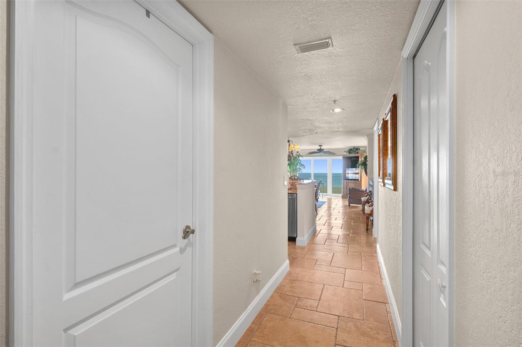2937 South Atlantic Avenue, Unit 1907 Daytona Beach Shores, FL 32118 - Photo 32 of 55 a view of a hallway with a outdoor space