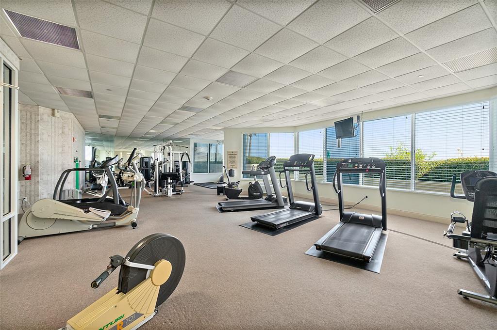 2937 South Atlantic Avenue, Unit 1907 Daytona Beach Shores, FL 32118 - Photo 43 of 55 a view of a room with gym equipment