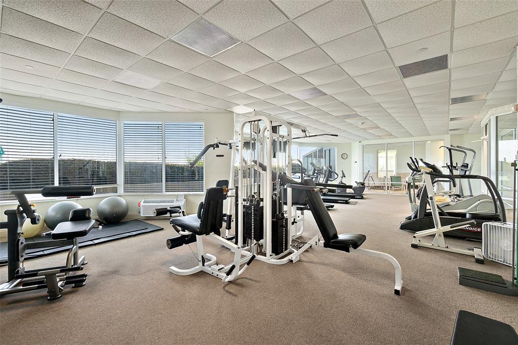 2937 South Atlantic Avenue, Unit 1907 Daytona Beach Shores, FL 32118 - Photo 45 of 55 a view of a room with gym equipment