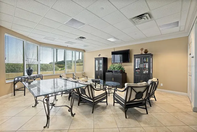 a patio with table and chairs