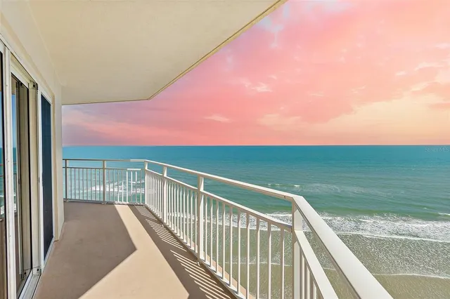 a view of balcony with ocean