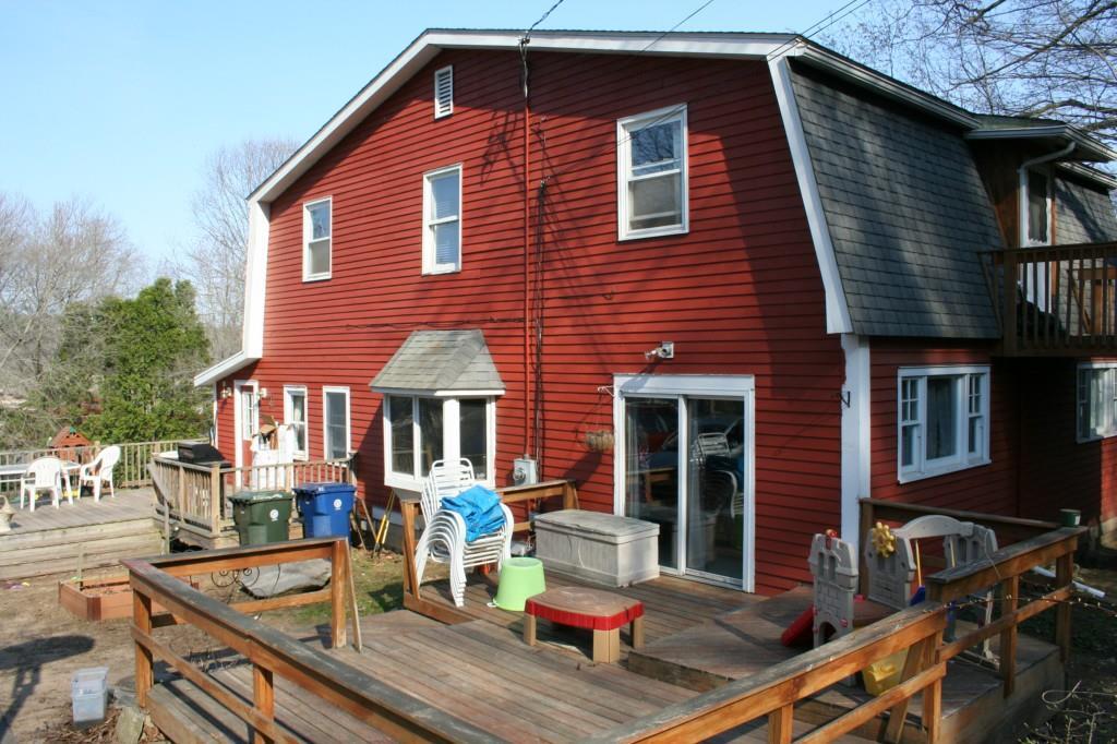 a front view of house with street