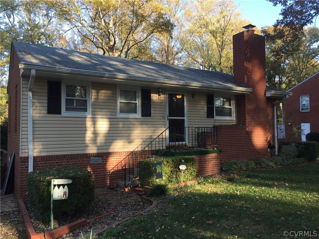 front view of a house with a yard