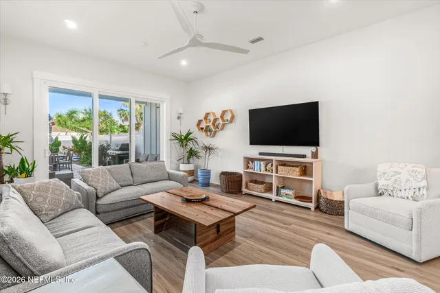 a view of entryway with wooden floor and stairs