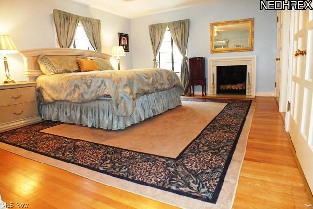 2729 Inverness Road Shaker Heights, OH 44122 - Photo 15 of 24 Master Bedroom has hardwood floors, Fireplace, His and Her closets and en-suite Master Bathroom