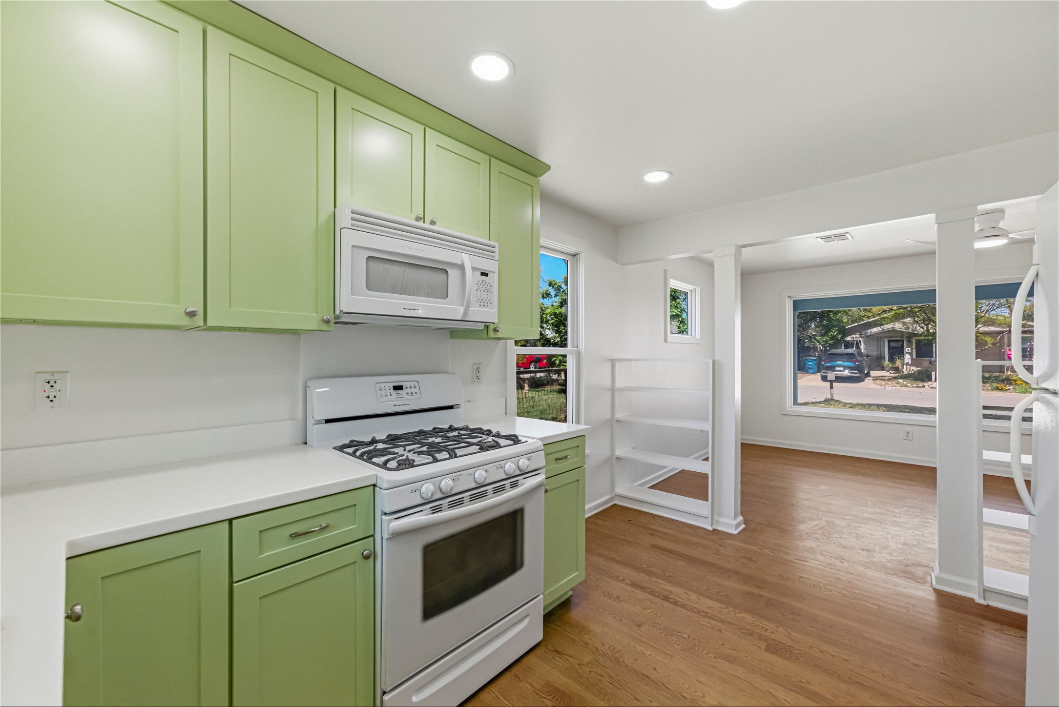 503 West Croslin Street Austin, TX 78752 - Photo 10 of 24 a kitchen with cabinets and steel appliances
