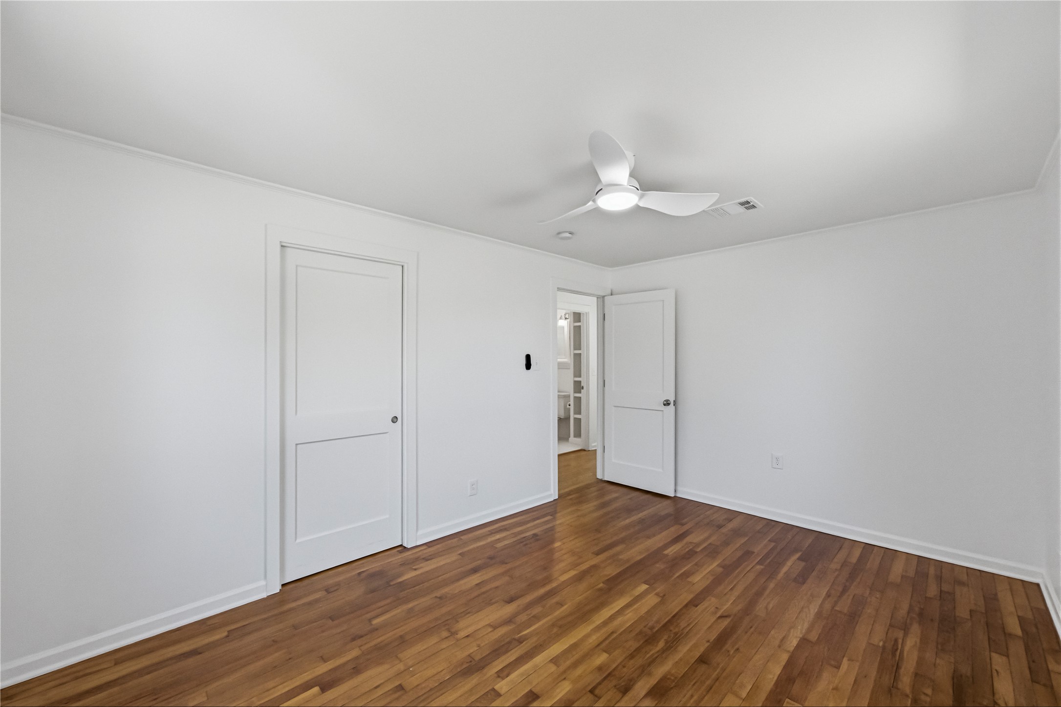 503 West Croslin Street Austin, TX 78752 - Photo 13 of 24 a view of a room with wooden floor