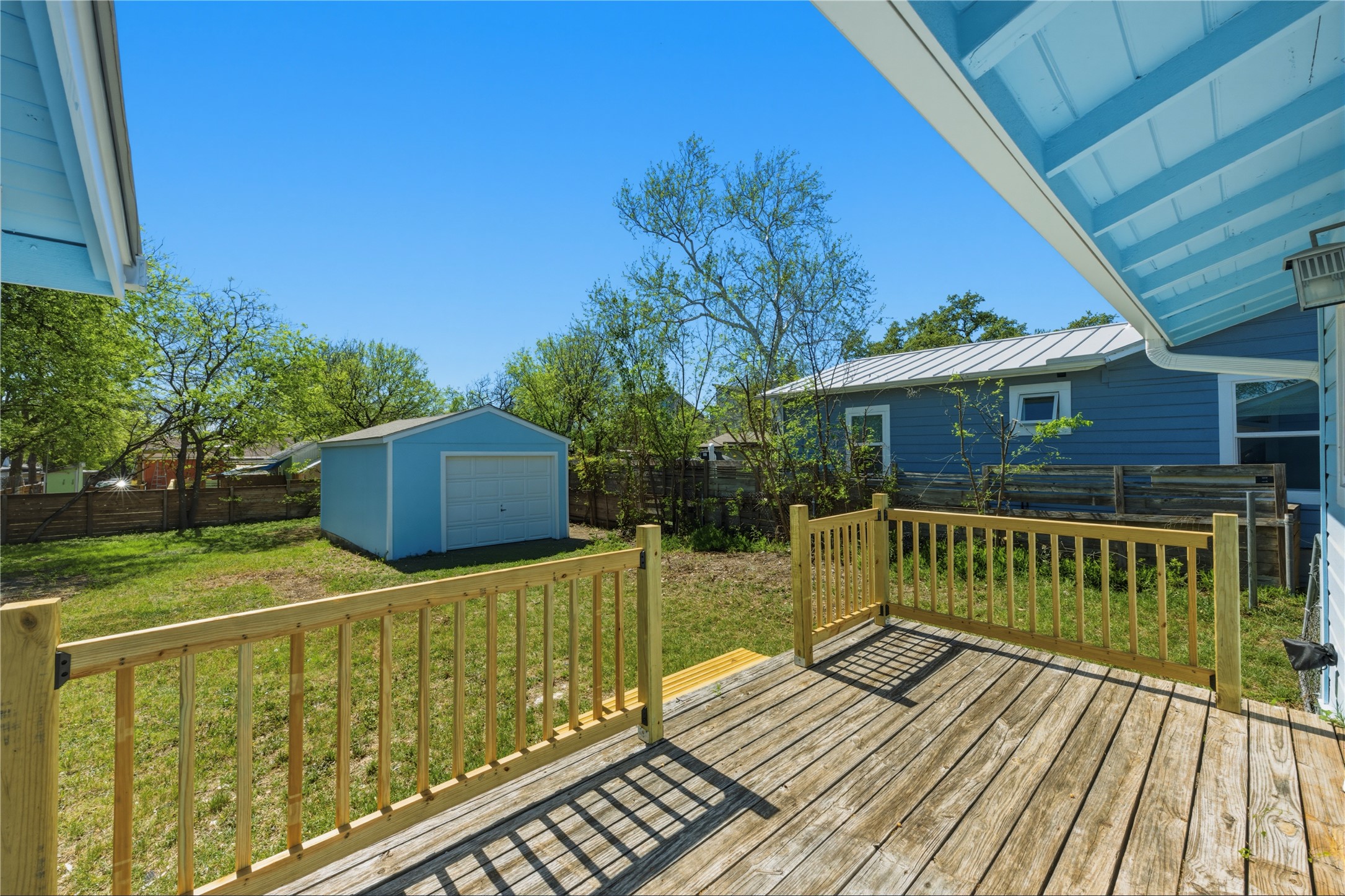 503 West Croslin Street Austin, TX 78752 - Photo 19 of 24 a view of a wooden deck with a yard