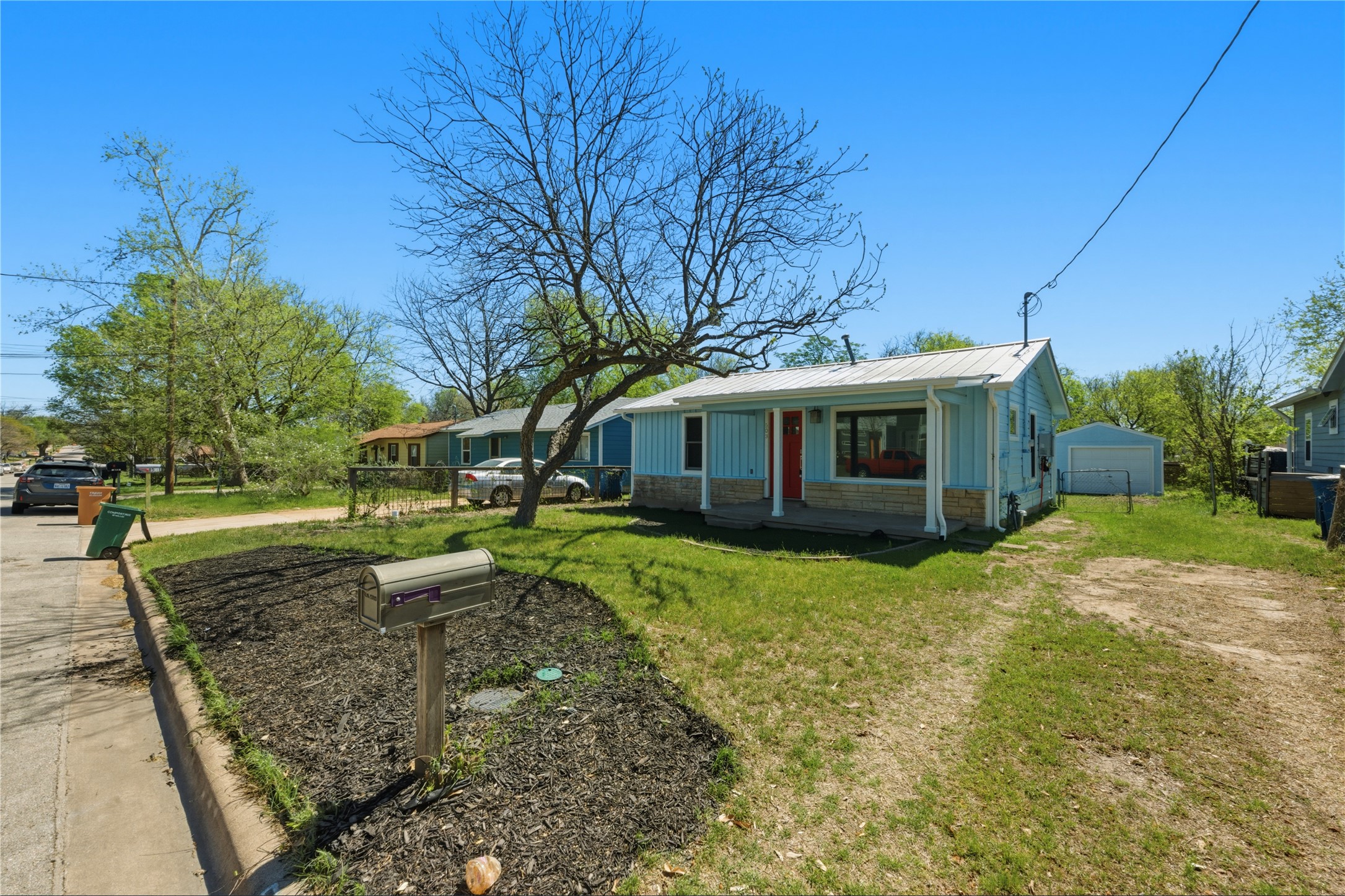 503 West Croslin Street Austin, TX 78752 - Photo 2 of 24 a view of a house with backyard