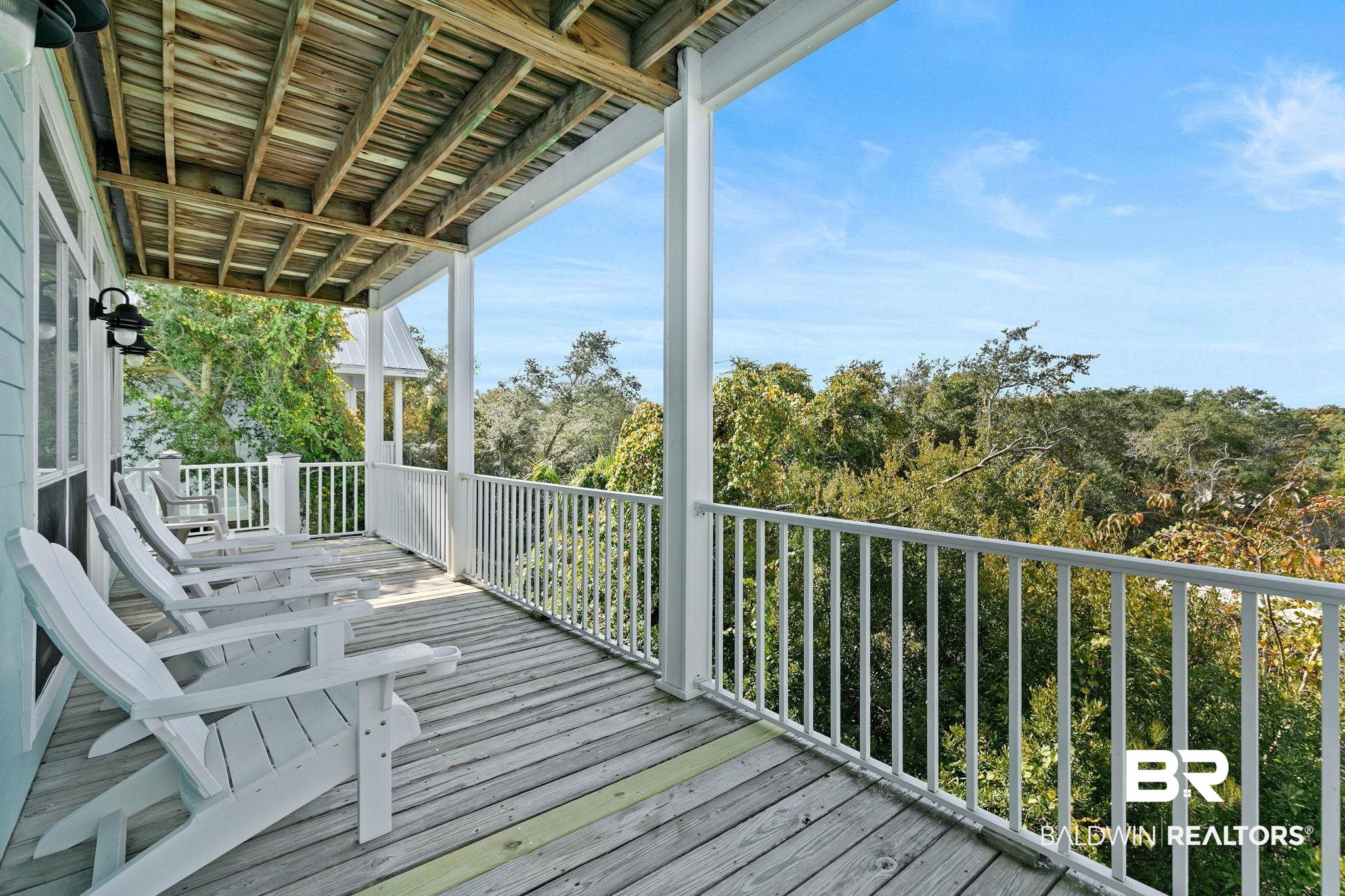 545 Plantation Road, Unit 3 Gulf Shores, AL 36542 - Photo 41 of 54 View of wooden porch