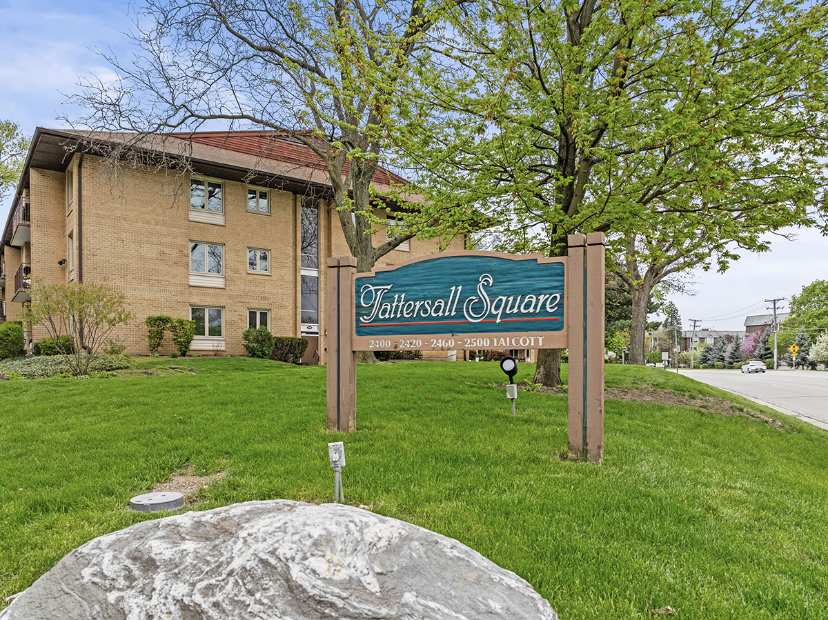 2420 West Talcott Road, Unit 211 Park Ridge, IL 60068 - Photo 1 of 28 a sign on the side of a building