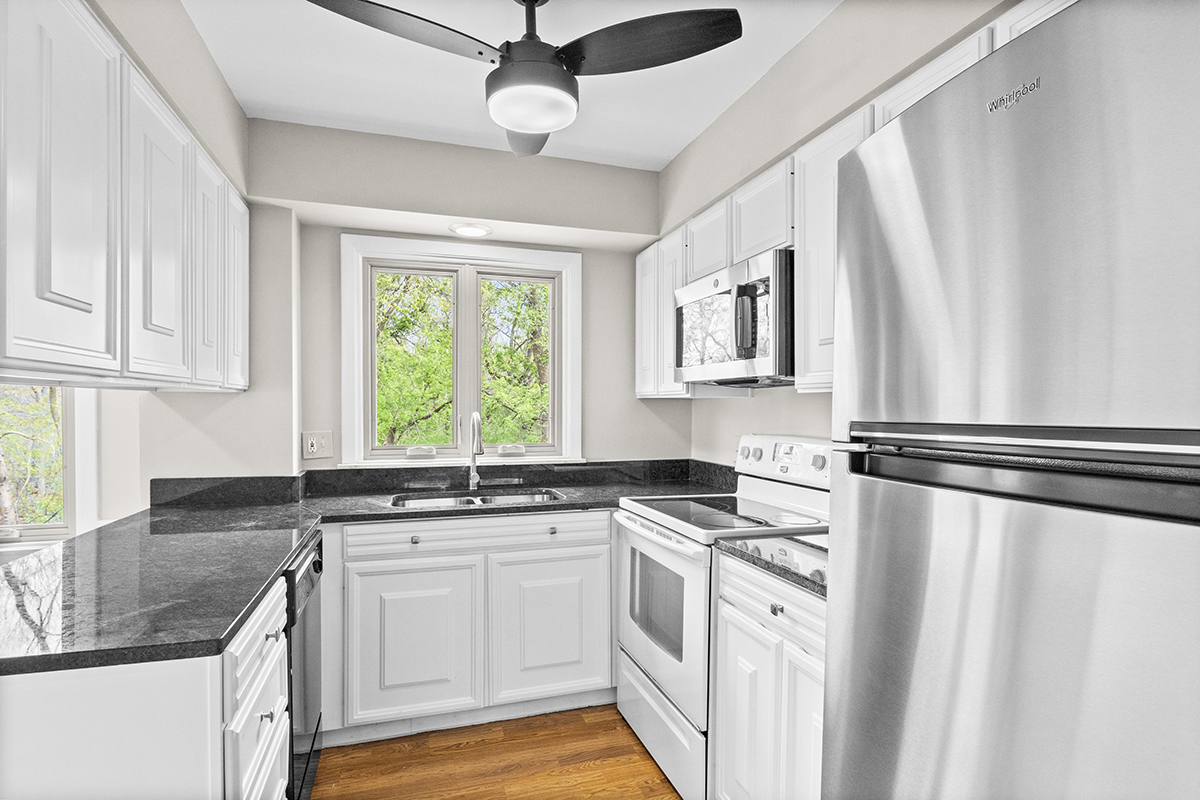 2420 West Talcott Road, Unit 211 Park Ridge, IL 60068 - Photo 12 of 28 a kitchen with stainless steel appliances a sink stove and cabinets