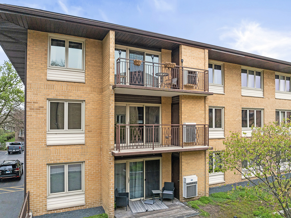 2420 West Talcott Road, Unit 211 Park Ridge, IL 60068 - Photo 25 of 28 a front view of a multi story building