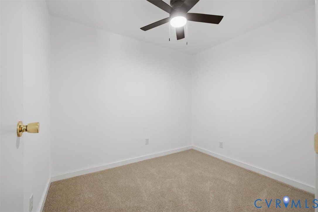 2338 George's Road Powhatan, VA 23139 - Photo 9 of 25 Neutral wall color, carpeted flooring, and a ceili