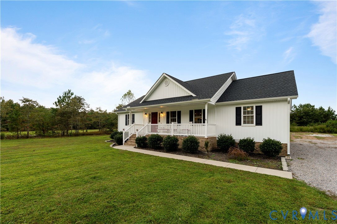 12442 Quaker Road Dinwiddie, VA 23841 - Photo 2 of 28 View of front of home featuring covered porch, a s