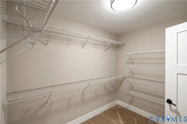 a view of a room with racks on the wall