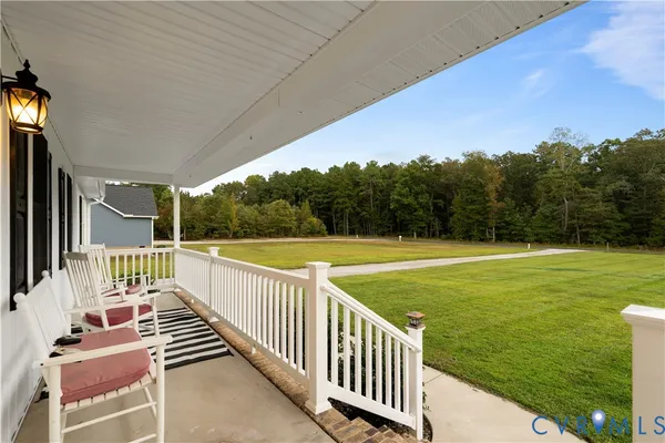 a view of a balcony with ocean view