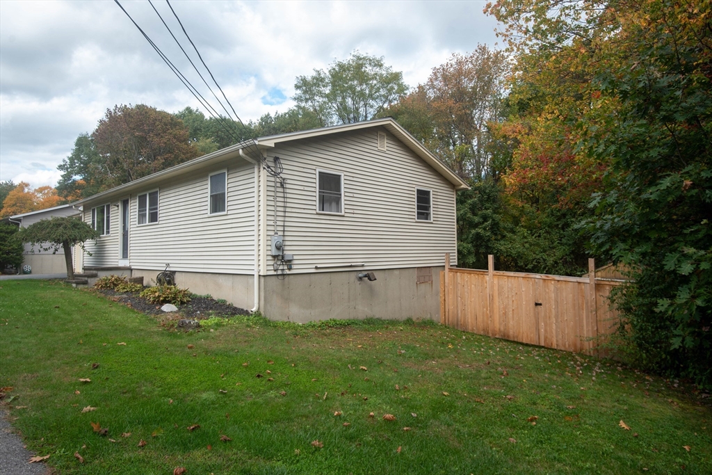 18 Birchwood Road Rutland, MA 01543 - Photo 4 of 42 a view of a backyard with large trees